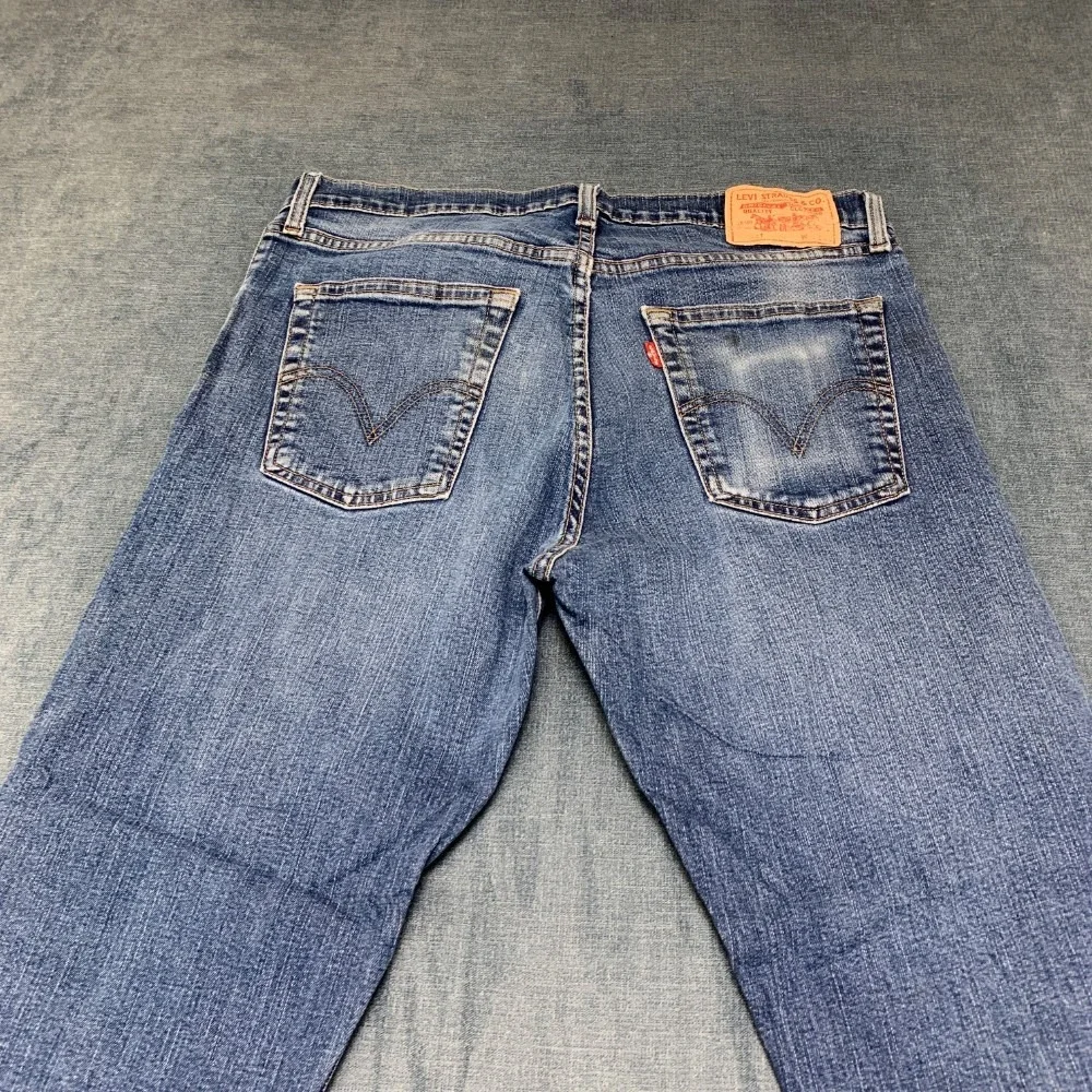 Vintage Levi's 521 Jeans Mens 38x30 Blue Denim Stretch Medium Wash Straight Leg